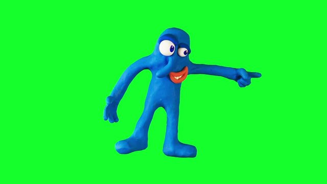 Clay Boy Pointing To The Side. Claymation. Greenscreen