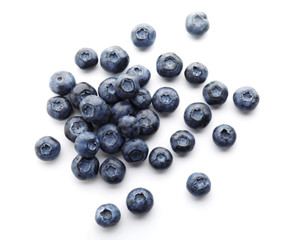 Ripe blueberries on white background