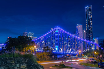Fototapeta na wymiar Glowing with blue light bridge in Brisbane
