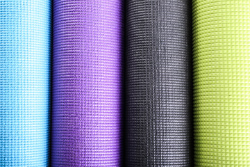 Different colorful yoga mats