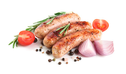 Composition with fried sausages on white background