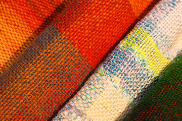 Background texture of soft wool, pattern. Close-up, selective focus, side view, copy space.