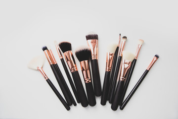 A Palette Of Colourful Eye Shadows And Brushes