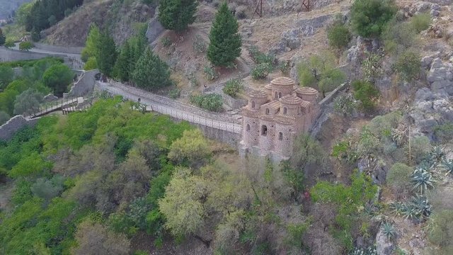 Stunning 4k backwards aerial, church in Stilo, in the valleys of Calabria, Italy