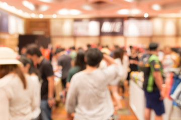 Abstract blurred discount sale event exhibition with people background.