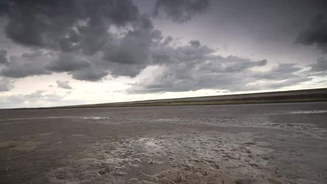 Storm clouds moving in over the Wadden sandflats