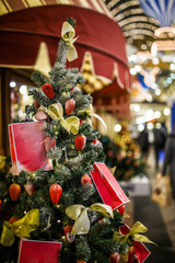 Picture of New Year's decorated fir on blurred background