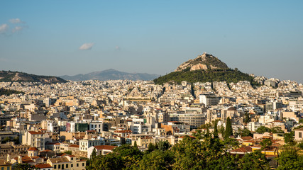 Obraz premium Lykavitos rising above modern Athens