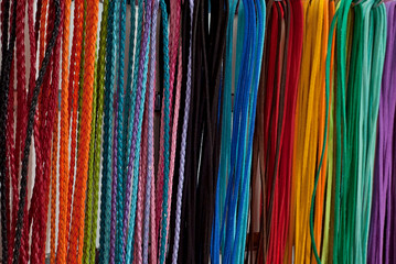 multicolored ropes in the store on the counter