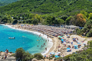 Fototapeta premium Olympiada, Greece - August 11, 2018: Proti Ammoudia beach, one of the most beautiful beaches in the Aegean Sea.