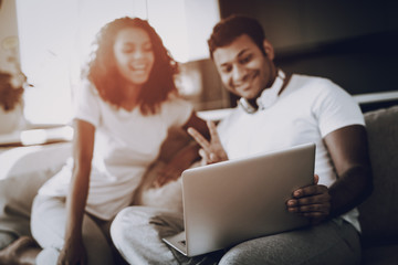 Afro American Couple Greeting On Laptop Camera.