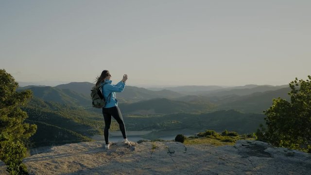 Female hiker on top of mountain