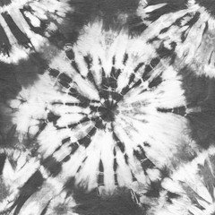 Abstract tie dyed fabric of black color on white cotton. Hand painted fabrics. Shibori dyeing