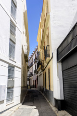 Fototapeta na wymiar view of a street in an old quarter of Seville, Andalucia, Spain.