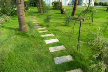 Stone paved path to the villa at tropical resort