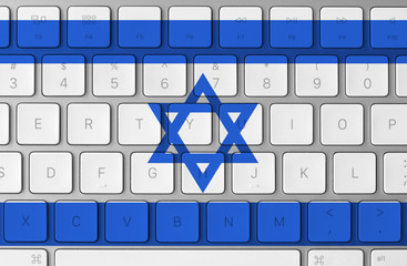Israel flag and computer keyboard in the background