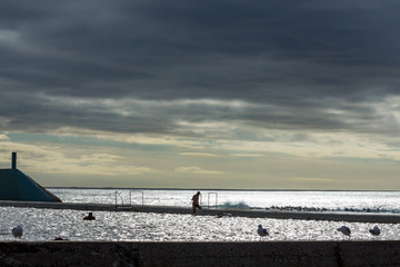 Early morning swimmers at ocean baths