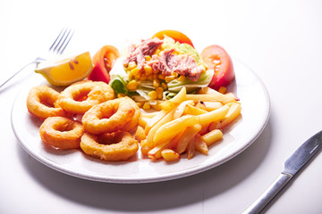 Fried potato and squid