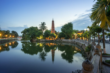 Tran Quoc pagoda during sunset time, the oldest temple in Hanoi, Vietnam. Hanoi cityscape.
