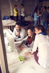 Group of designers in office working