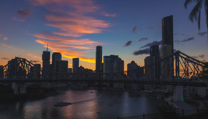 Bridge and city during sunset