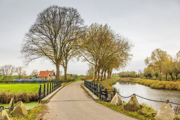 Fototapeta premium Bridge over Inlet sluice of Fort Everdingen for the flooding of the Nieuwe Hollandse Waterlinie with water from the river Lek