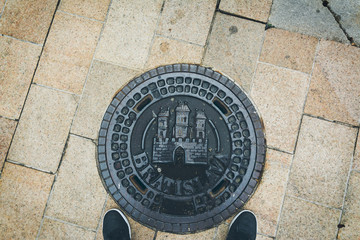  view of manhole cover in old town Bratislava, Slovakia