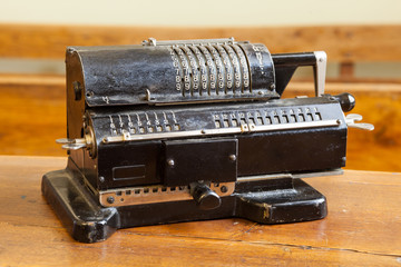 Old mechanical manual counting machine for mathematical calculations