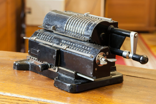 Old mechanical manual counting machine for mathematical calculations