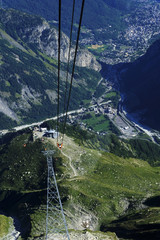 View from the Mont Blanc Skyway Monte Bianco cable car towards Courmayeur and Aosta Valley. Italy.