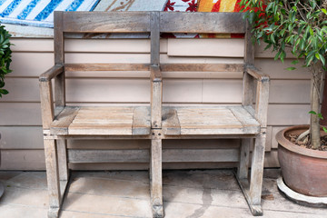 an old vintage wood chair in the garden