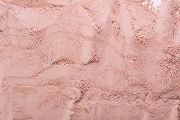 Cosmetic clay texture, background. Natural pink mask, dry clay for the face and body.