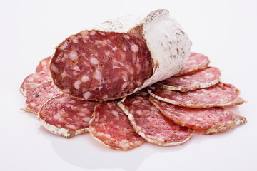 Saucisson sec delicious french salami on a white background
