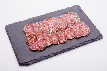Saucisson sec delicious french salami on a white background