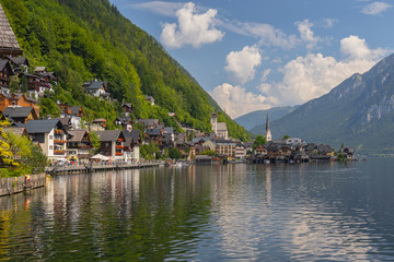 View across lake Hallstattersee to World Heritage lakeside town in the Austrian Alps, Hallstatt, Salzkammergut Austria.