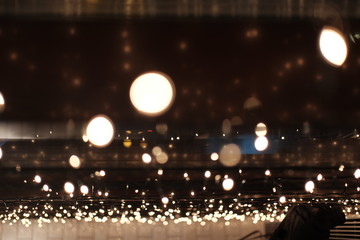Blurred Christmas lights. Christmas garland on the window