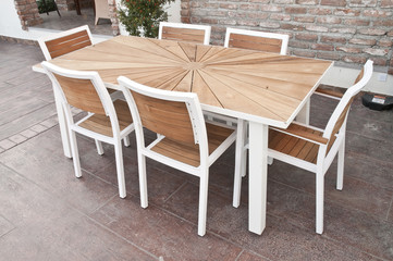 Fototapeta na wymiar metal and wood outdoor patio furniture for dining 