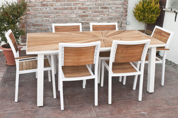 Fototapeta na wymiar metal and wood outdoor patio furniture for dining 