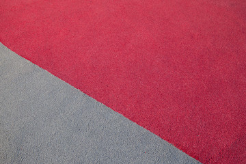 Rubber floor texture. Granules playground cover background.