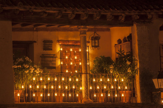 Balcony, iluminated only by candles. La noche de las velas de Pedraza, Segovia
