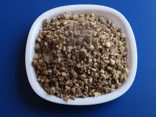 Tribulus terrestris fruit Gokhru,The seeds of devil's thorn (Tribulus terrestris plant) on white background, Gokhru Seeds on Wooden Background,Gokhru,Bindii,Tribulus terrestris