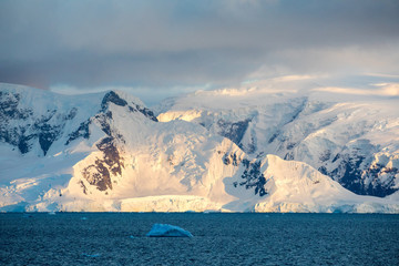 ice in the Antarctica with iceberg in the ocean