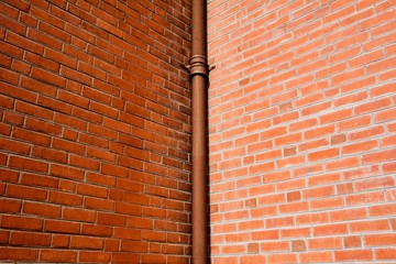 pipe at antique brick building