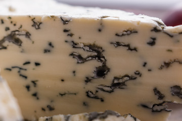 delicious blue cheese on wooden rustic background