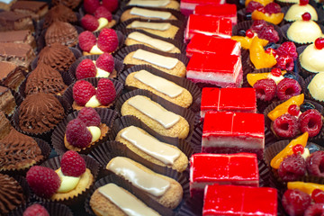 Variety of Fresh baked homemade cakes in small French bakery in Provence