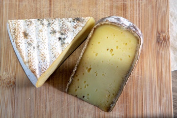 French hard cow or goat cheese Tomme or Tome, produced in French Alps