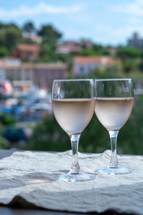 Rose wine of Provence, France, served cold on outdoor terrace in two wine glasses