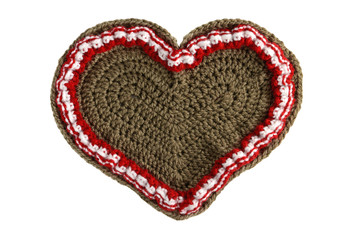 hand crochet Gingerbread heart shape valentines day gift with copy space on white isolated background.