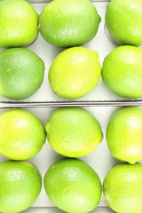 fresh lime fruits in boxes