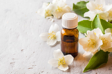 Obraz na płótnie Canvas Jasmine oil. Aromatherapy with Jasmine oil and soap. Jasmine flower